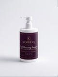 Kimbelo curl shampoo, white pump bottle with the plum Kimbelo label, front