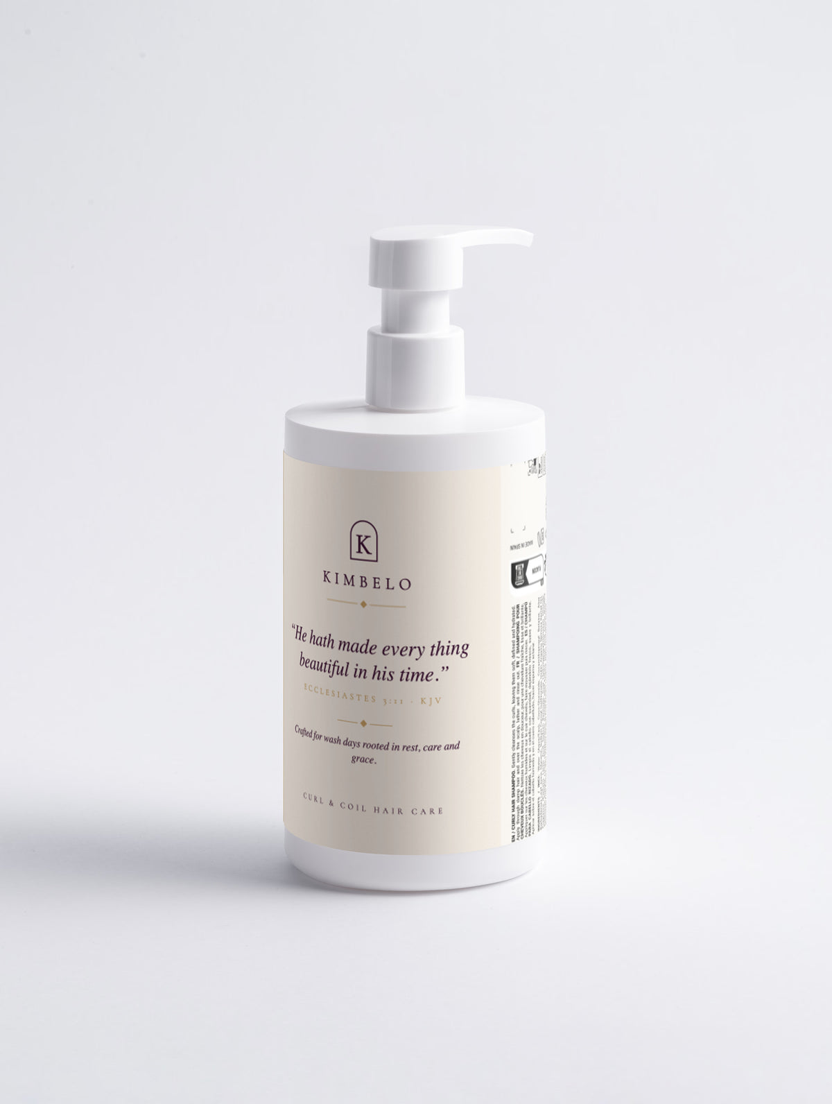 Back of the Kimbelo curl shampoo bottle with the verse panel and ingredient label